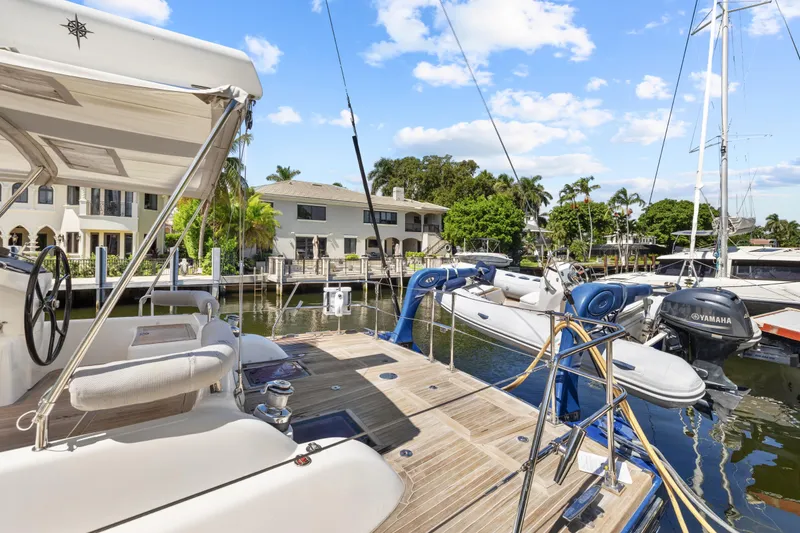 Slide: The Image of Luxury Hylas 63 yacht docked in a scenic marina, 2013 model. - 78