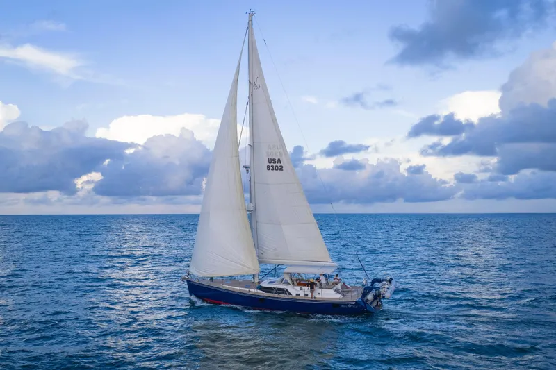 Slide: The Image of Sailing yacht Hylas 63 (2013) gliding on open sea under a cloudy sky. - 8