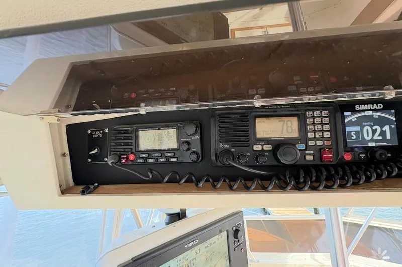 Slide: The Image of Control panel of a 1986 Viking 35 Convertible boat with navigation equipment. - 38