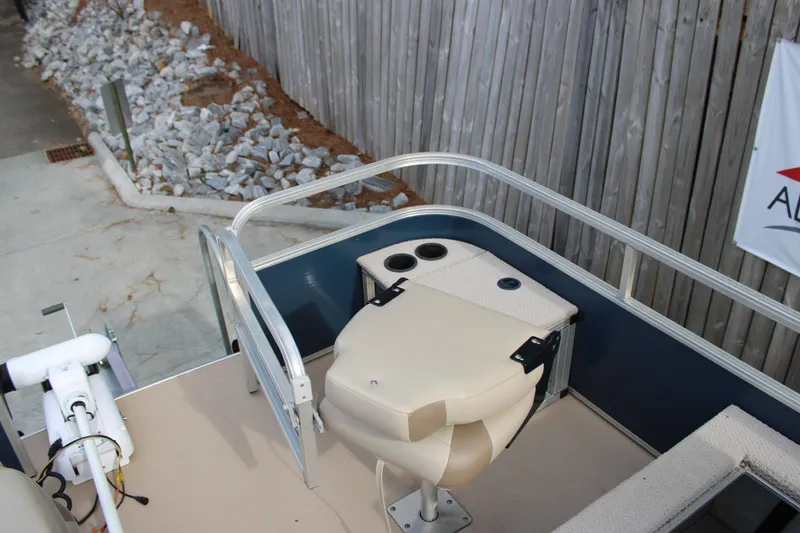 Slide: The Image of 2016 Lowe Ultra 182 Fish & Cruise boat with seating and cup holders. - 10