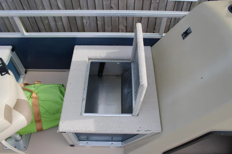 Slide: The Image of 2016 Lowe Ultra 182 Fish & Cruise boat with open storage compartment. - 11