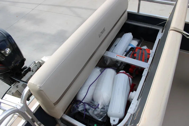Slide: The Image of 2016 Lowe Ultra 182 Fish & Cruise boat storage with safety equipment and accessories. - 15