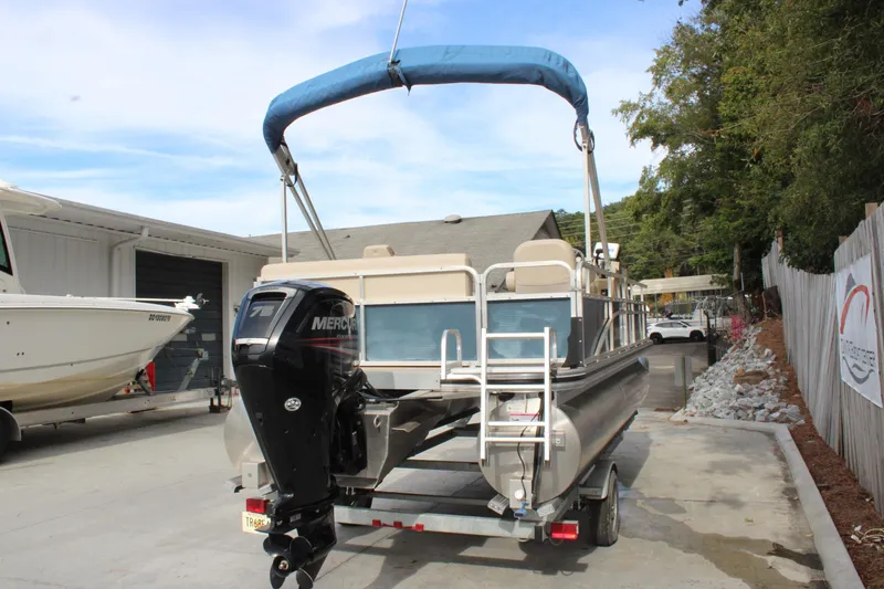 Slide: The Image of 2016 Lowe Ultra 182 Fish & Cruise boat on trailer with outboard motor. - 4