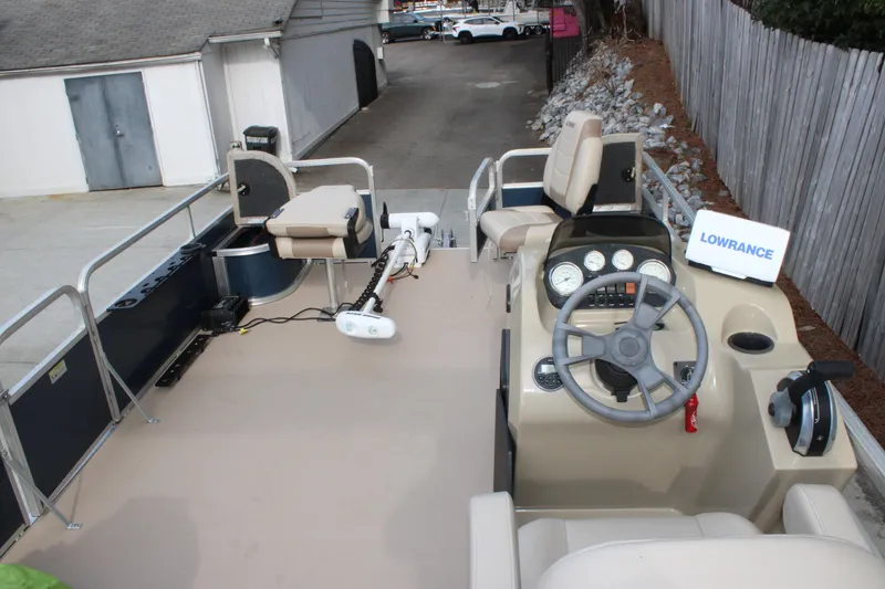 Slide: The Image of 2016 Lowe Ultra 182 Fish & Cruise boat interior with steering console and seating. - 5