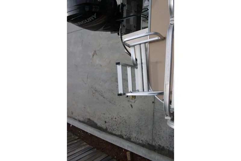 Slide: The Image of 2016 Lowe Ultra 182 Fish & Cruise boat with Mercury engine and ladder. - 6