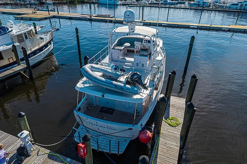 Slide: The Image of 2019 Kadey-Krogen 44 AE yacht docked at marina, aerial view. - 4