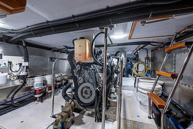 Slide: The Image of Engine room of 2019 Kadey-Krogen 44 AE yacht, showcasing machinery and equipment. - 62