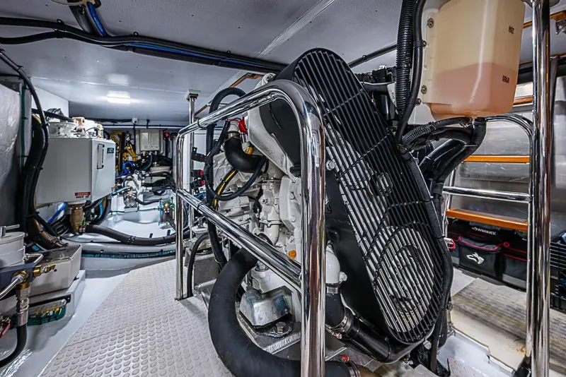 Slide: The Image of Engine room of 2019 Kadey-Krogen 44 AE yacht, showcasing machinery and components. - 63