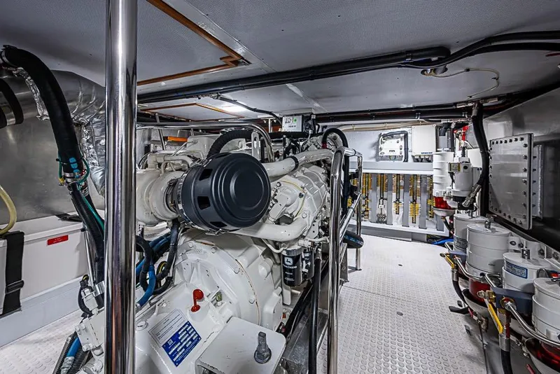 Slide: The Image of Engine room of 2019 Kadey-Krogen 44 AE yacht, showcasing advanced machinery and equipment. - 65