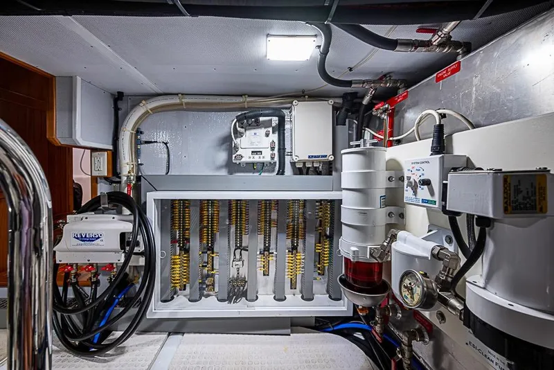 Slide: The Image of Engine room of 2019 Kadey-Krogen 44 AE yacht, featuring advanced mechanical systems. - 66