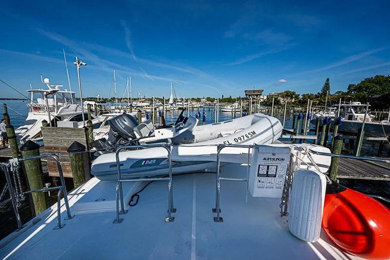 Slide: The Image of 2019 Kadey-Krogen 44 AE yacht docked with inflatable boat on deck. - 58