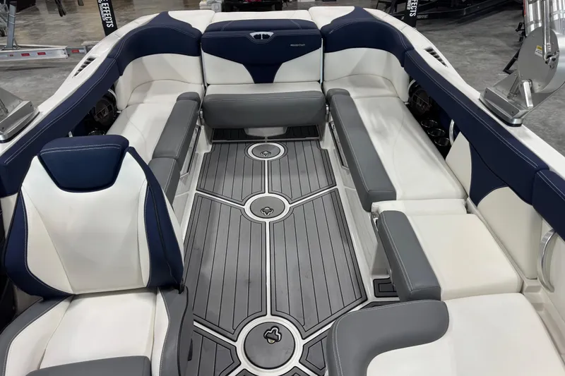 Slide: The Image of 2019 MasterCraft XT25 boat interior with stylish seating and modern design. - 16