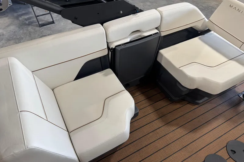 Slide: The Image of Luxurious seating on 2025 Manitou 26 Explore boat with elegant design and premium materials. - 13