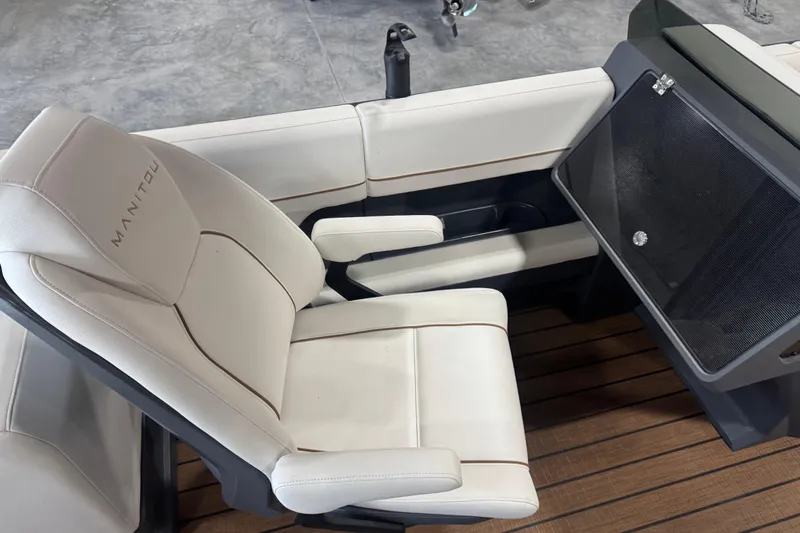 Slide: The Image of Luxurious seating on 2025 Manitou 26 Explore boat with sleek design and premium materials. - 18
