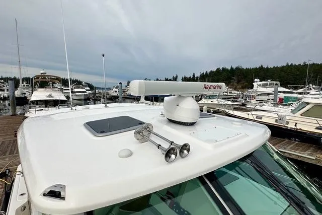 Slide: The Image of 2021 Boston Whaler 345 Conquest Pilothouse with Raymarine radar at marina. - 17