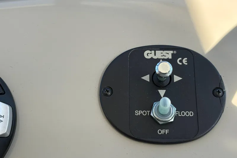 Slide: The Image of Control panel of a 2012 Sea Ray 370 Sundancer with navigation and audio systems. - 12