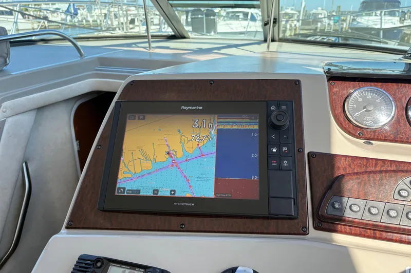 Slide: The Image of Interior view of 2012 Sea Ray 370 Sundancer boat with open storage compartment. - 5