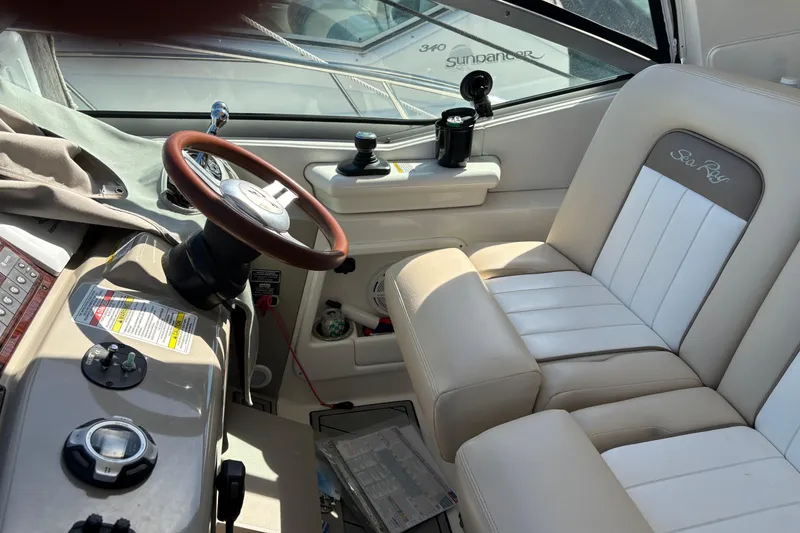 Slide: The Image of Control panel of a 2012 Sea Ray 370 Sundancer with navigation display. - 7