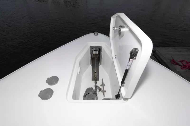 Slide: The Image of Open anchor locker on 2017 Sea Hunt Gamefish 27 Coffin Box boat. - 18