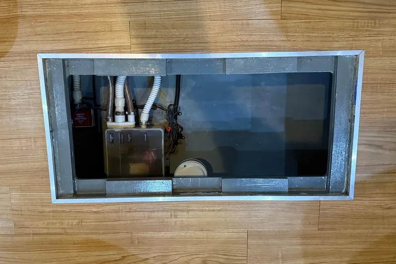 Slide: The Image of Bilge compartment of 2000 Sea Ray 380 Sundancer with visible wiring and components. - 23