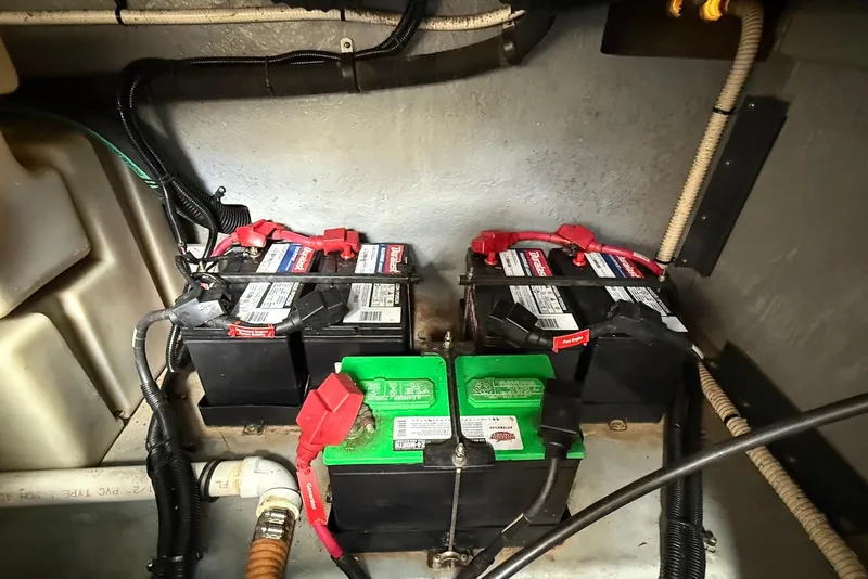 Slide: The Image of Batteries in a 2000 Sea Ray 380 Sundancer boat engine compartment. - 27