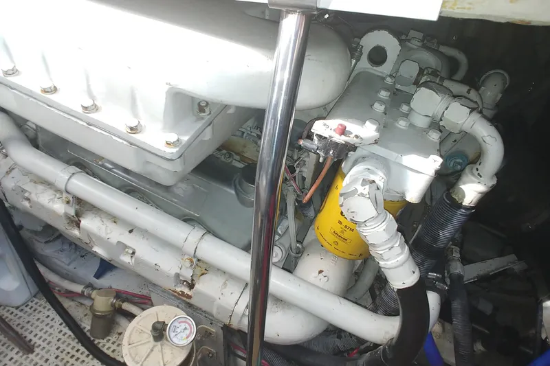 Slide: The Image of Engine compartment of a 1992 Tiara Yachts 3600 Open, showcasing mechanical components. - 8