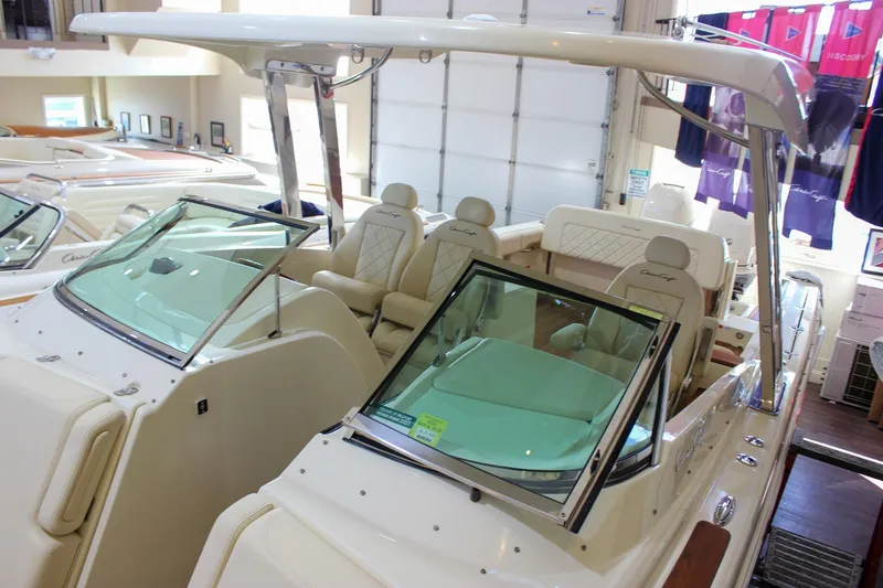 Slide: The Image of 2018 Chris-Craft Calypso 30 boat interior with sink and storage area. - 20