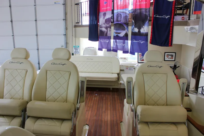 Slide: The Image of Luxurious interior of 2018 Chris-Craft Calypso 30 with plush seating and elegant design. - 37