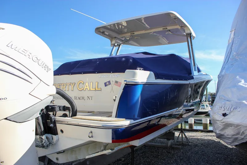 Slide: The Image of 2018 Chris-Craft Calypso 30 with twin 300 horsepower outboard engines. - 5