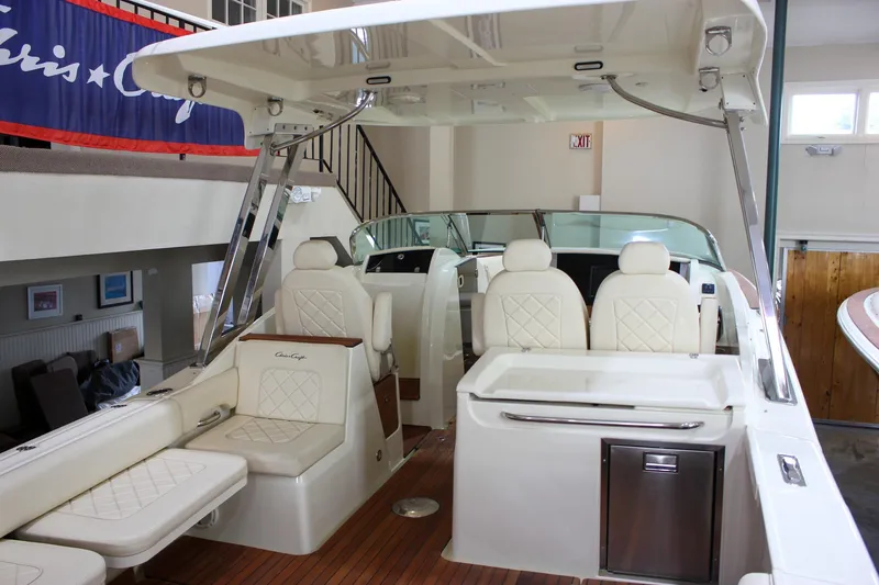 Slide: The Image of 2018 Chris-Craft Calypso 30 boat interior with luxurious seating and modern design. - 66