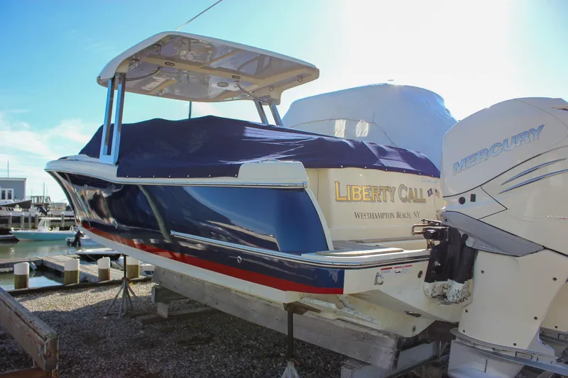 Slide: The Image of 2018 Chris-Craft Calypso 30 boat with Mercury engine, docked at Westhampton Beach. - 76