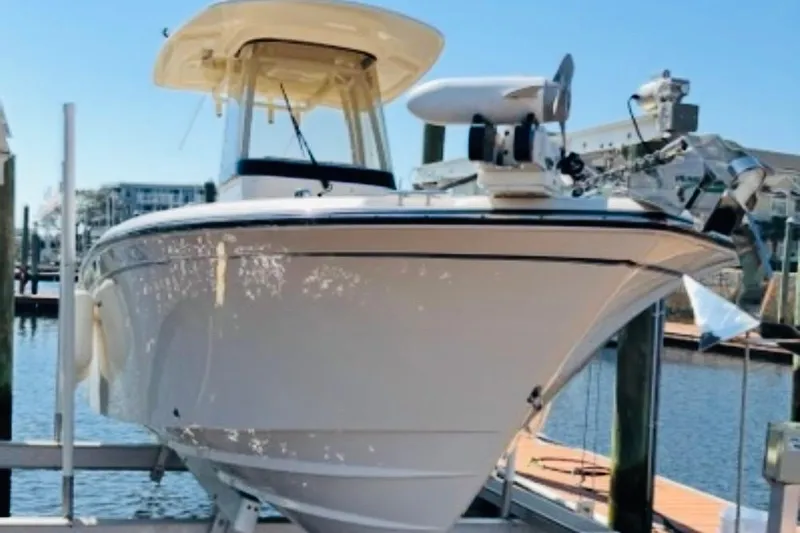 Slide: The Image of 2022 Grady-White Fisherman 257 boat interior with open storage compartments. - 13