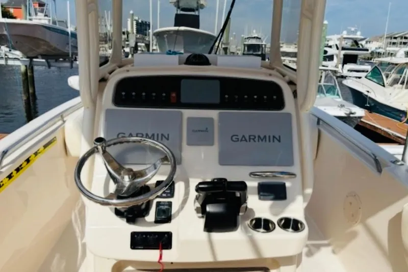 Slide: The Image of Open storage compartment on 2022 Grady-White Fisherman 257 boat. - 14