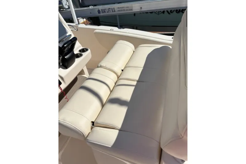 Slide: The Image of Manufacturer Provided Image: 2023 Grady-White Fisherman 257 boat cruising on water with passengers. - 21