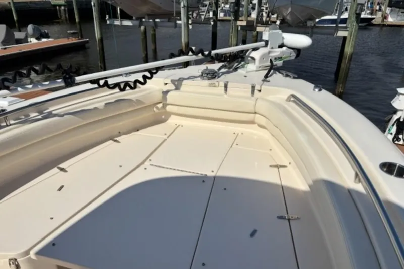 Slide: The Image of Trim tab control panel on 2022 Grady-White Fisherman 257 boat. - 23