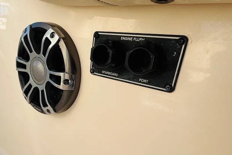 Slide: The Image of 2022 Grady-White Fisherman 257 boat engine flush ports and speaker detail. - 27