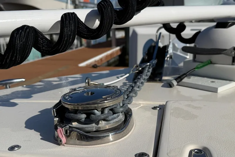 Slide: The Image of 2022 Grady-White Fisherman 257 boat deck with anchor chain and winch. - 28