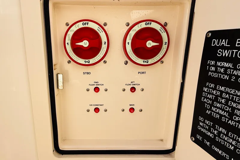 Slide: The Image of Control panel of a 2022 Grady-White Fisherman 257 boat with dual battery switches. - 34