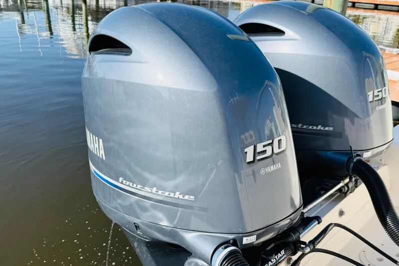 Slide: The Image of Twin Yamaha 150 four-stroke engines on 2022 Grady-White Fisherman 257 boat. - 36