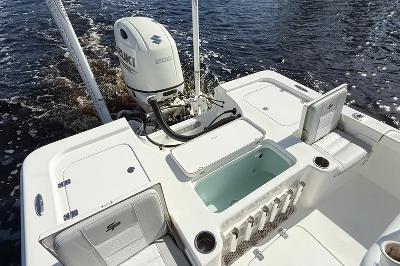 Slide: The Image of 2020 Sea Pro 228 Center Console boat with Suzuki 200 engine on water. - 12