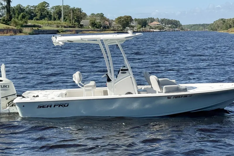 Slide: The Image of 2020 Sea Pro 228 Center Console boat on a scenic river. - 3