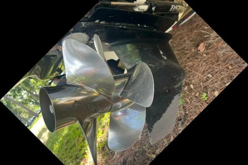 Slide: The Image of Close-up of a 2003 Sea Ray 220 Bow Rider boat propeller in a natural setting. - 20