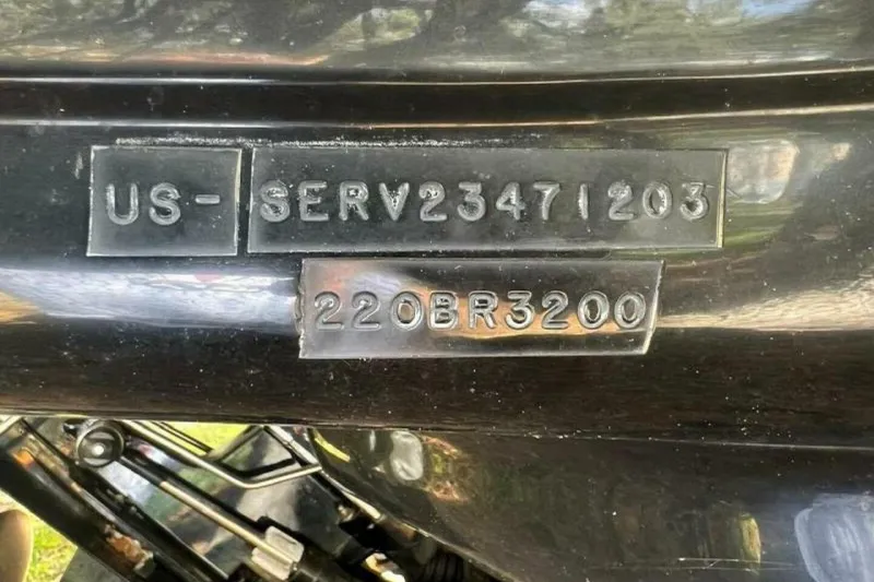 Slide: The Image of 2003 Sea Ray 220 Bow Rider hull identification number and model plate. - 31