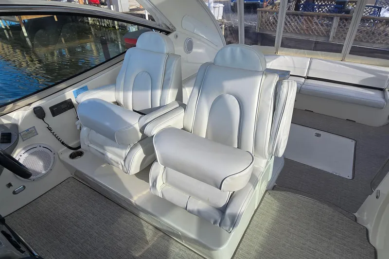 Slide: The Image of 2005 Cruisers Yachts 500 Express boat grill station with open lid and faucet. - 22