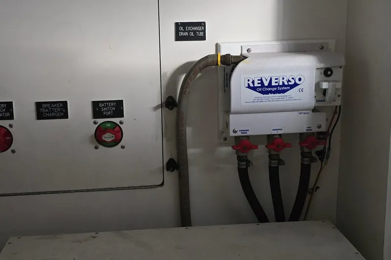 Slide: The Image of Engine compartment of 2005 Cruisers Yachts 500 Express, open hatch view. - 55