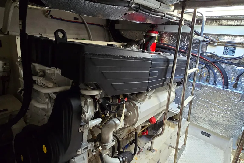 Slide: The Image of Onan marine generator in 2005 Cruisers Yachts 500 Express engine room. - 56