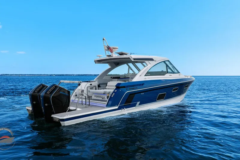 Slide: The Image of 2025 Formula 380 Super Sport Crossover OB on open water, showcasing sleek design and powerful engines. - 14