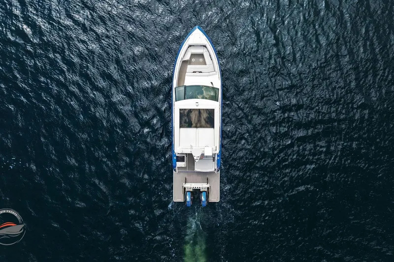 Slide: The Image of Aerial view of 2025 Formula 380 Super Sport Crossover OB on open water. - 16