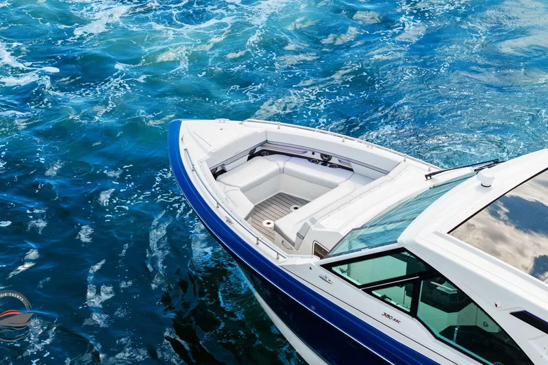 Slide: The Image of 2025 Formula 380 Super Sport Crossover OB on vibrant blue water. - 18