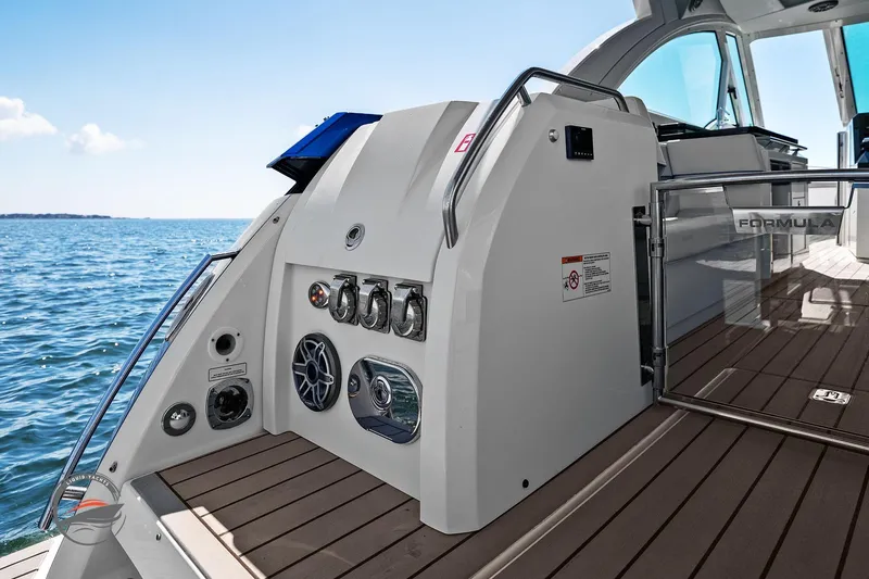 Slide: The Image of 2025 Formula 380 Super Sport Crossover OB yacht deck with ocean view. - 21